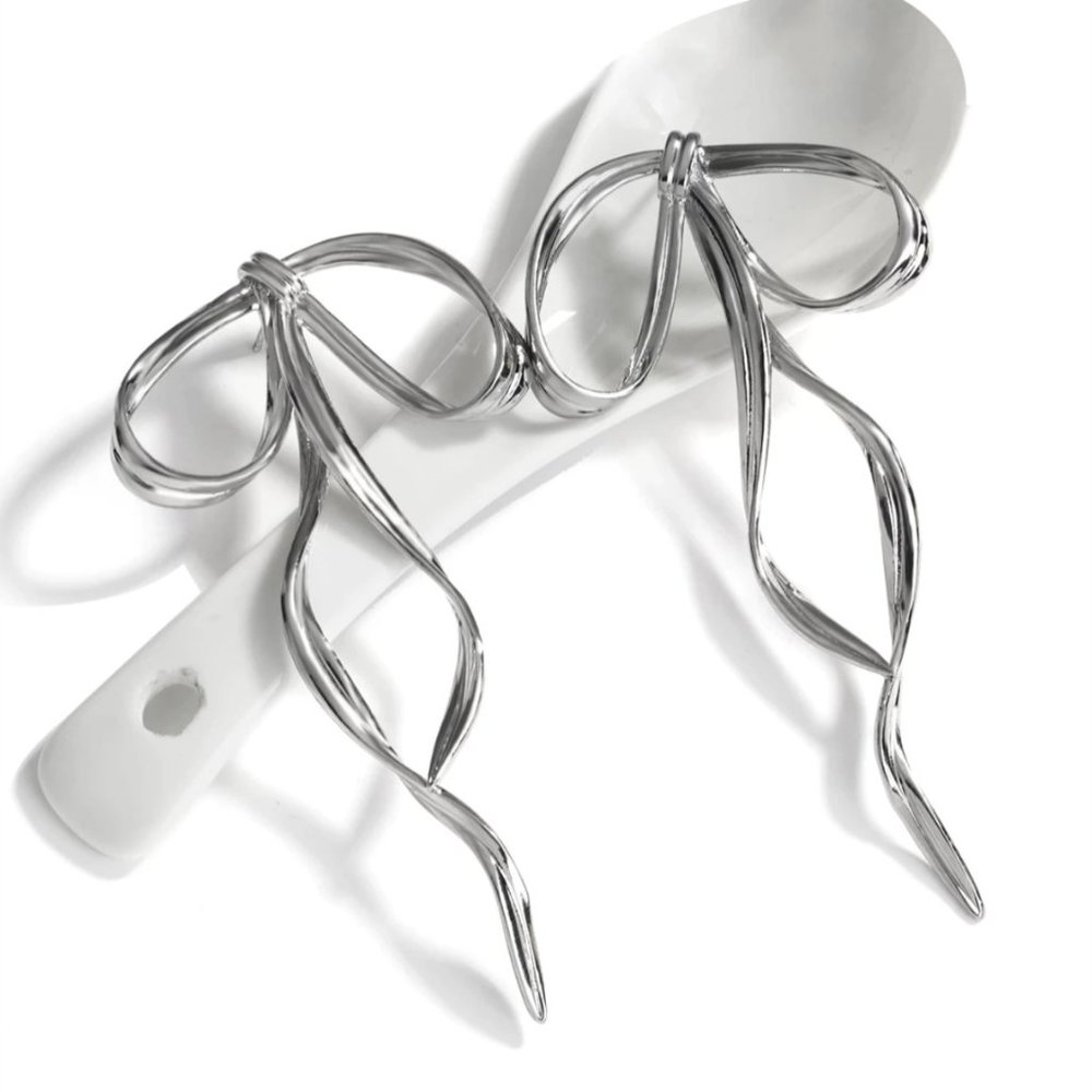 Anthro Silver Bow Earring - Picture 4 of 9